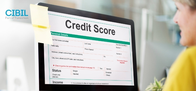 Computer displaying credit score report with CIBIL branding for managing suit filed issues